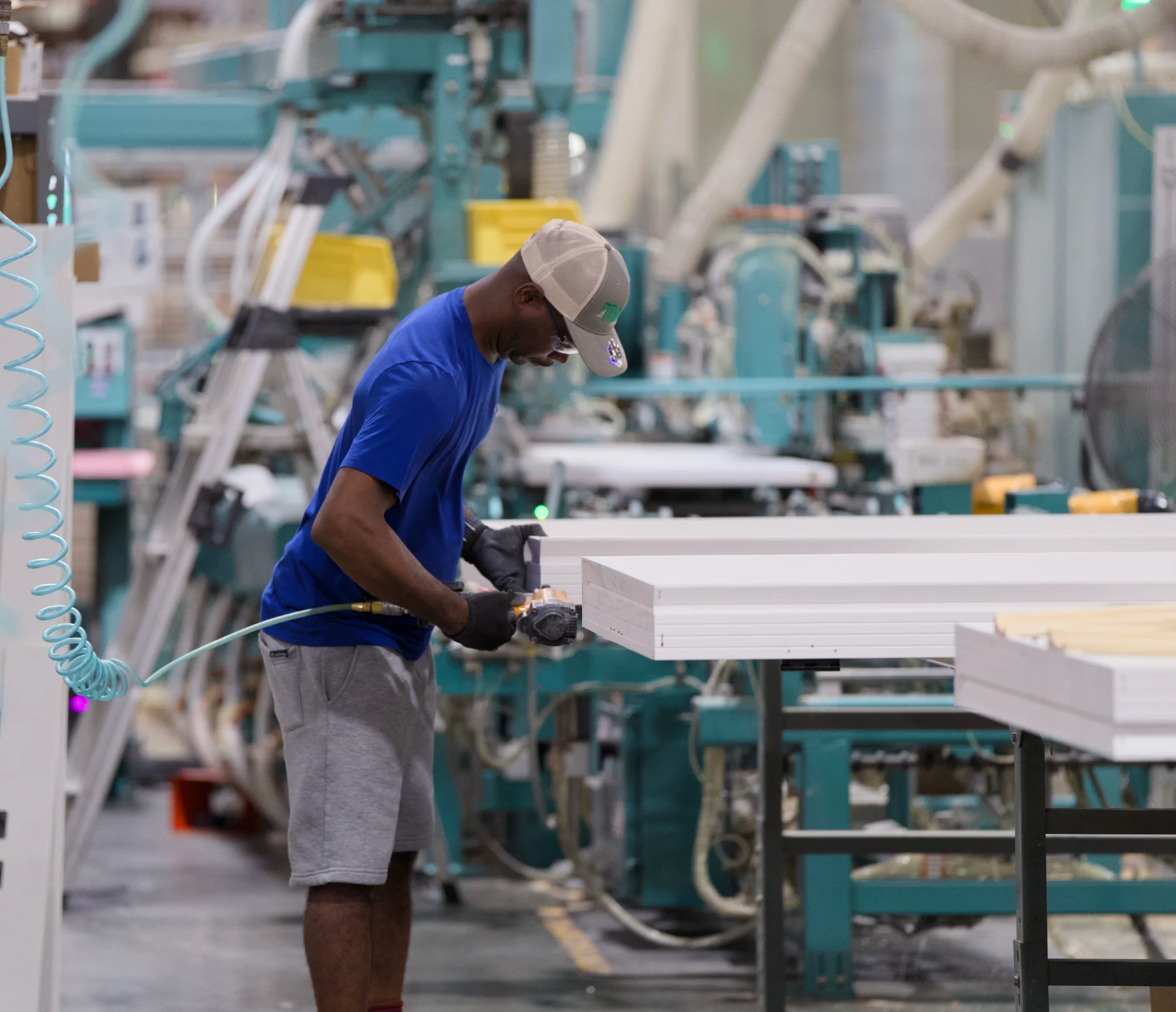 A Tucker fabricator machining a door jamb on the production line