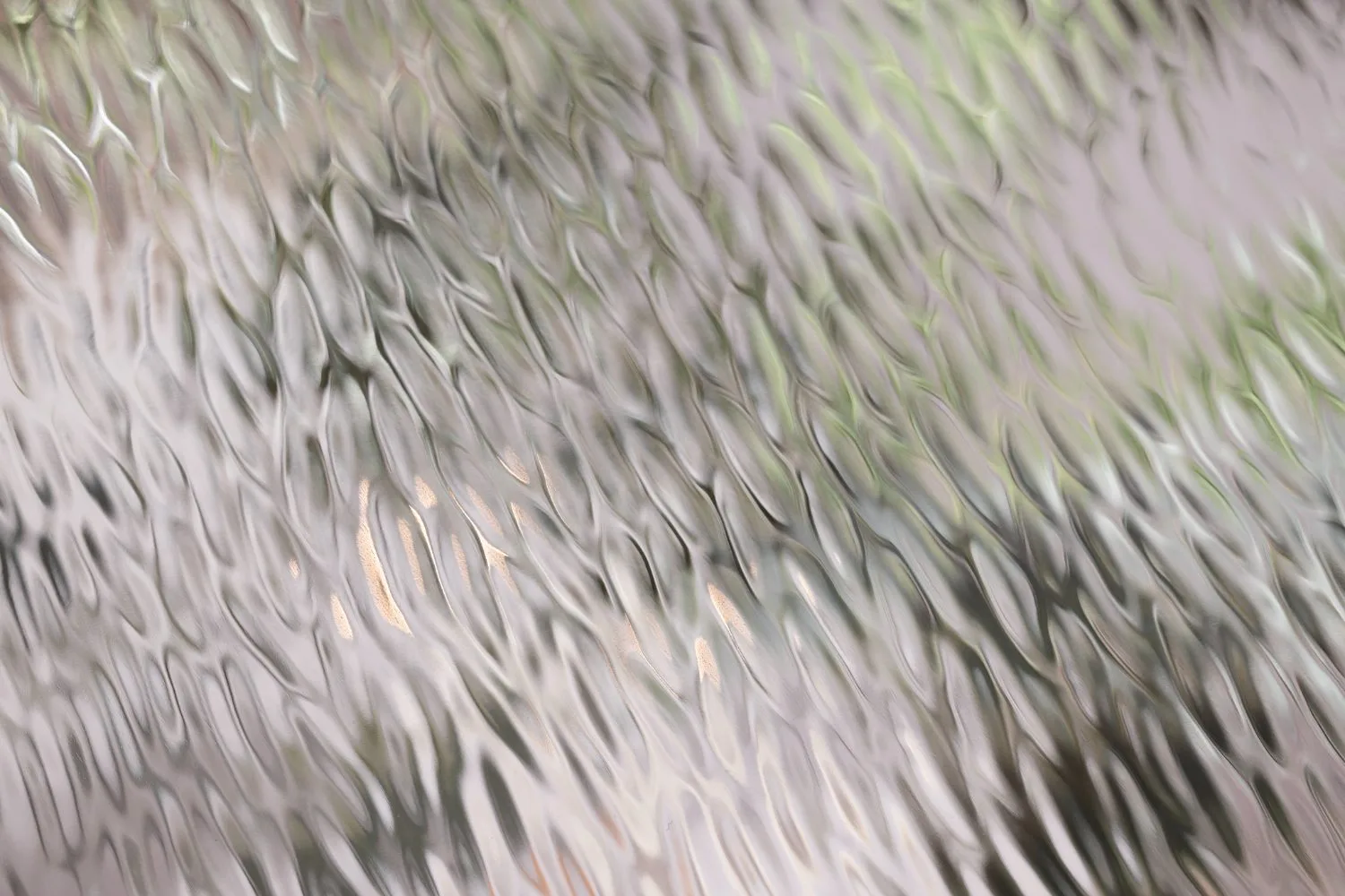 Close-up of ODL double waterglass, showing the poured, uneven surface that softens the view through