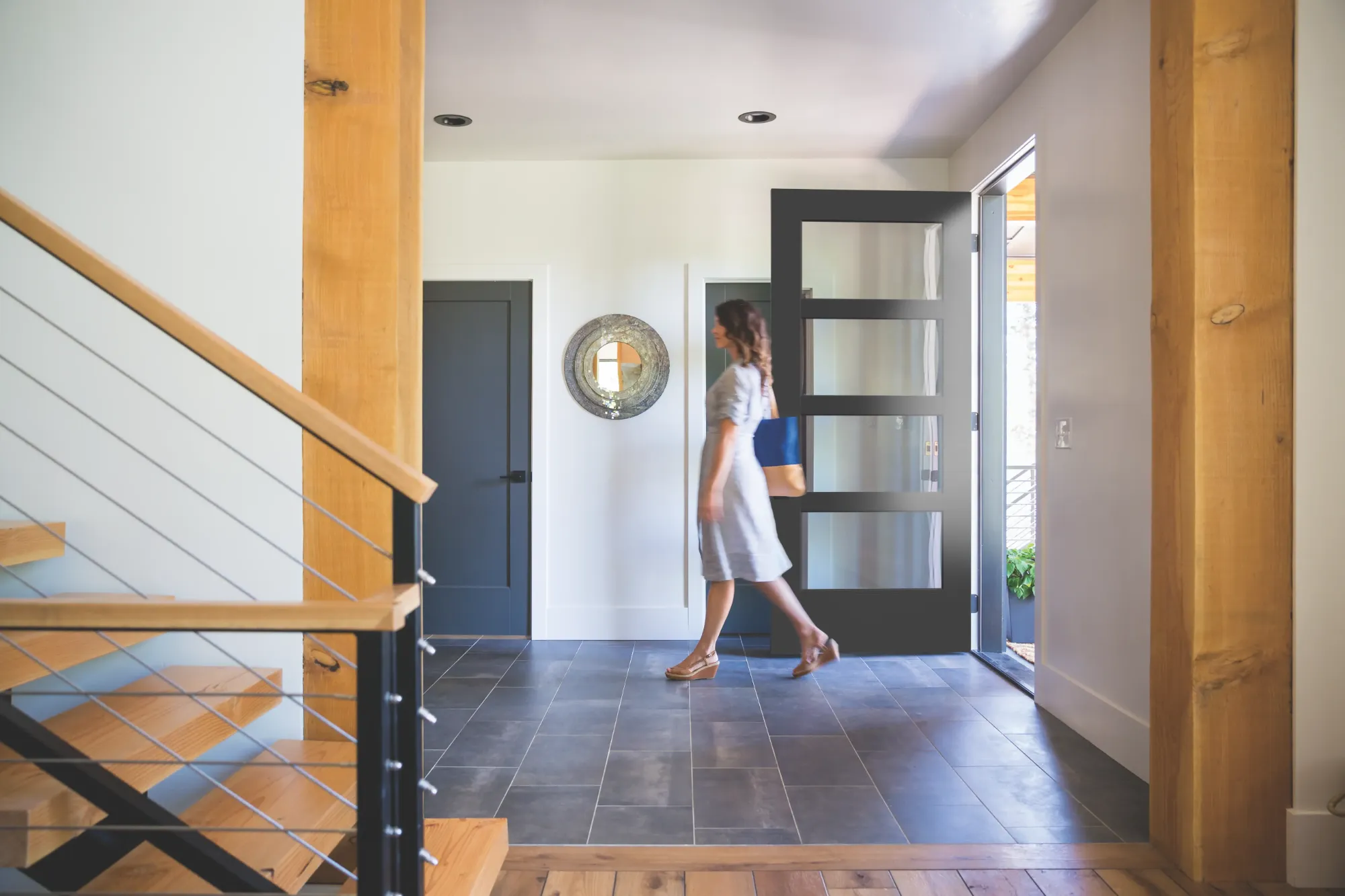 A Masonite four lite entry door seen from the foyer