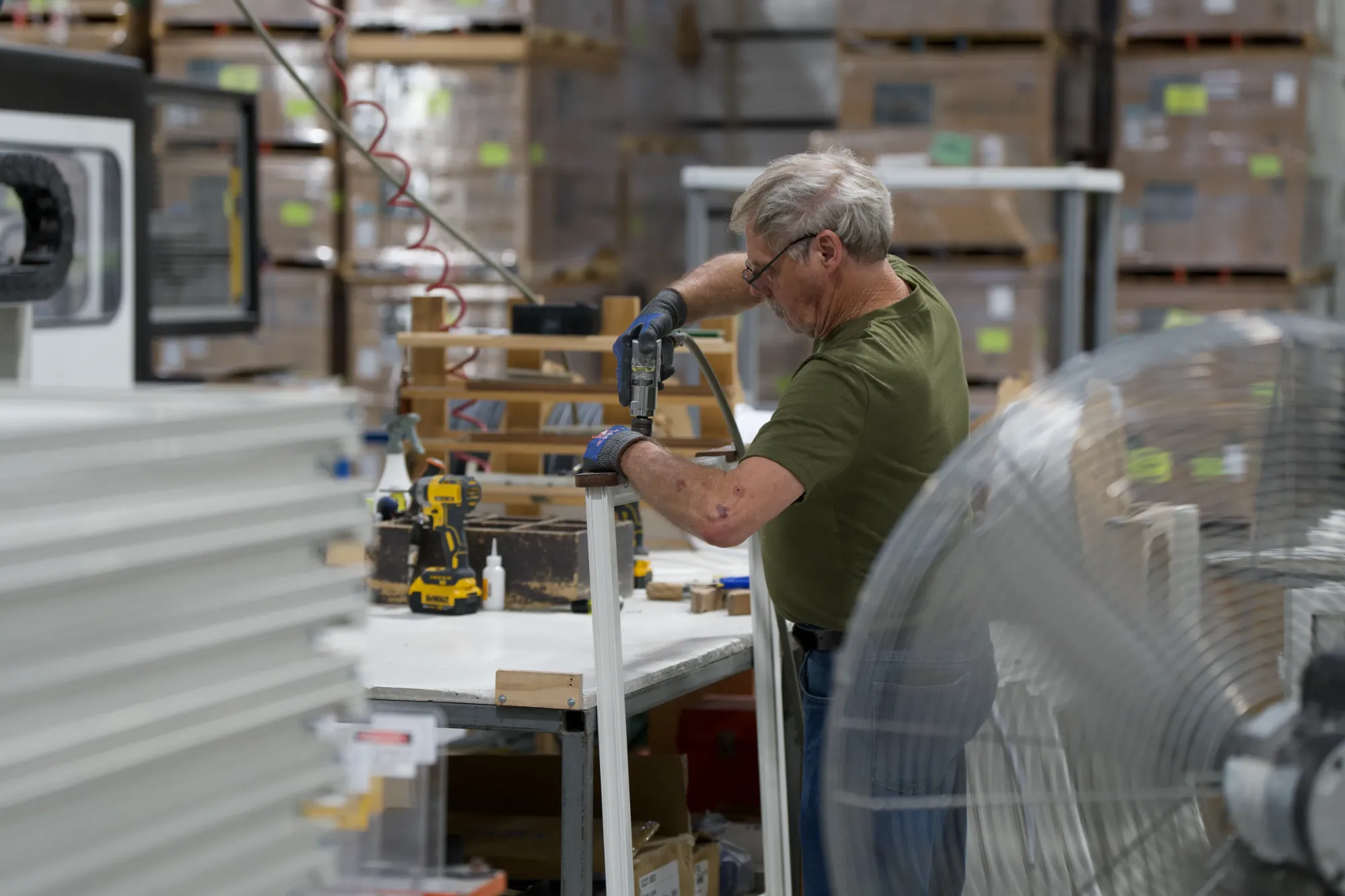 A Tucker fabricator assembling a door unit
