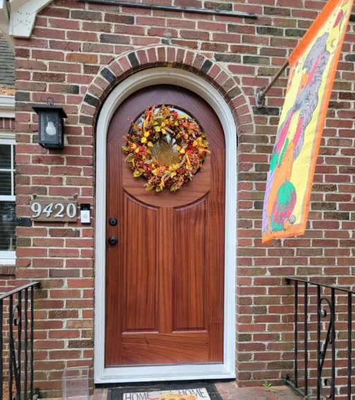 Arched mahogany on brick